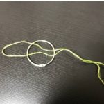 Checking that both leader strands sit correctly on the solid ring